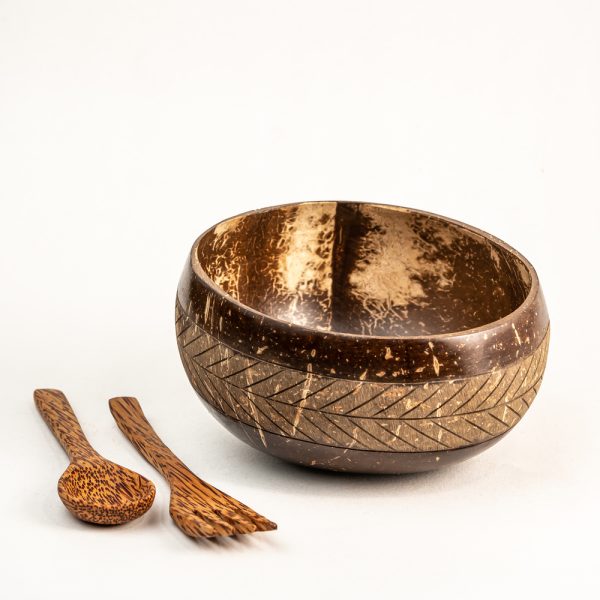 Coconut shell bowl with fork and spoon