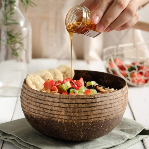 fruit salad bowl with organic honey