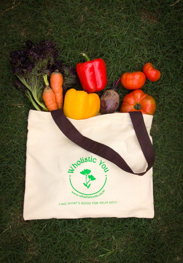 cotton bag containing fresh vegetables