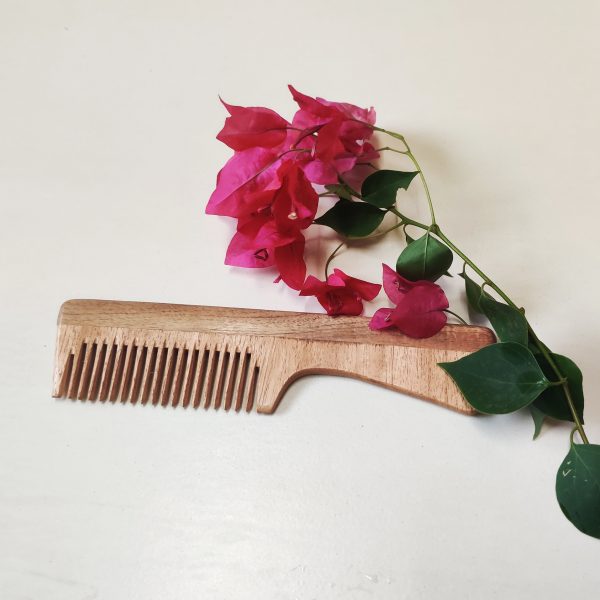 wooden comb and flower